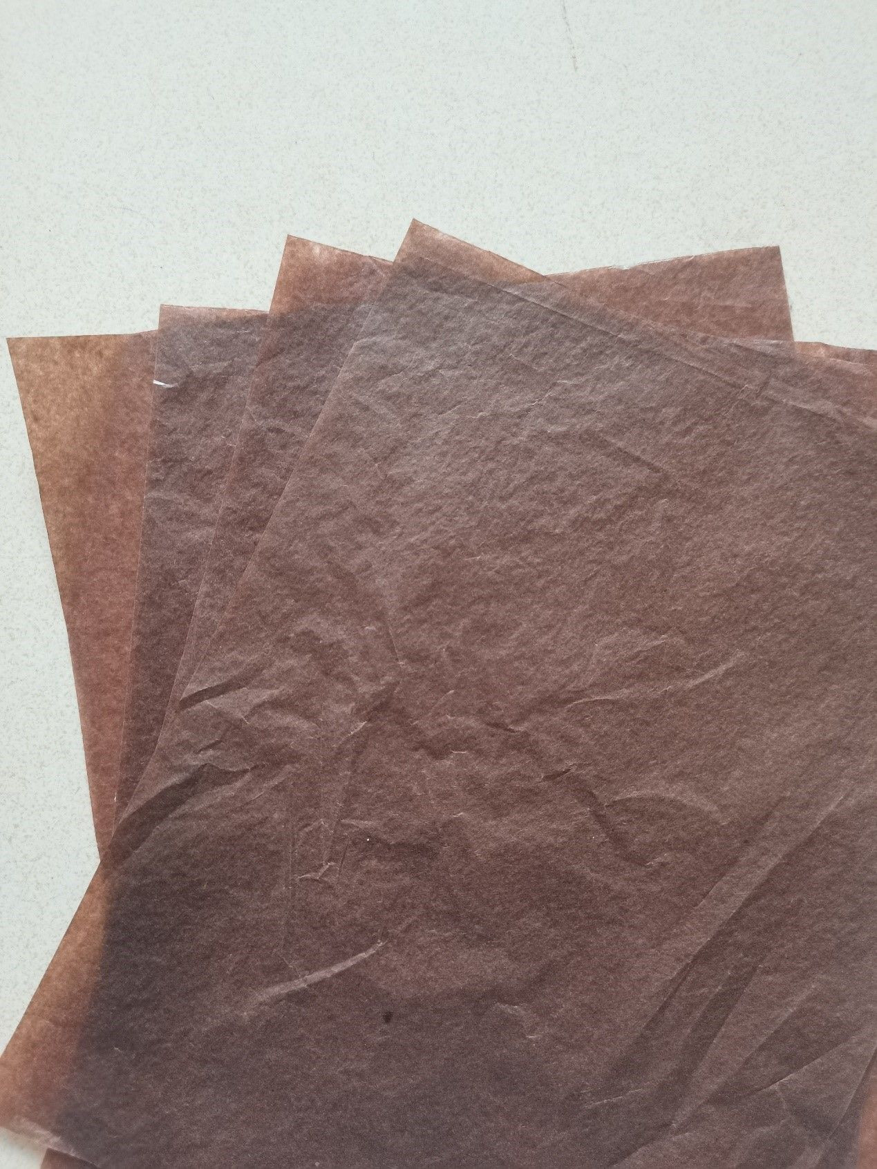 Translucent paper for fruit packaging